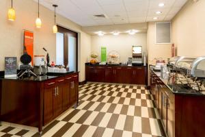 a restaurant kitchen with a checkered floor at Hampton Inn Santa Barbara/Goleta in Santa Barbara