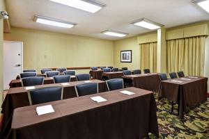 a conference room with tables and chairs in it at Hampton Inn St. Louis - Westport in Maryland Heights