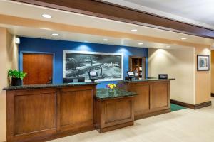 a hotel lobby with a reception desk and a tv at Hampton Inn & Suites Sacramento-Elk Grove Laguna I-5 in Elk Grove