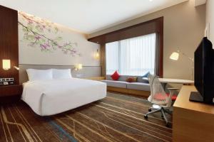 TV a/nebo společenská místnost v ubytování Hilton Garden Inn Shenzhen Bao'an