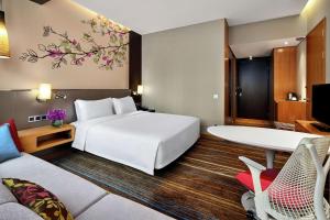 Postel nebo postele na pokoji v ubytování Hilton Garden Inn Shenzhen Bao'an + 37 fotografií