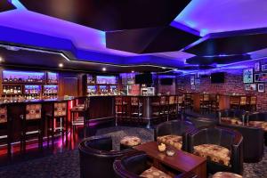 The lounge or bar area at Transcorp Hilton Abuja
