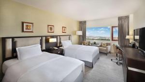 A television and/or entertainment centre at Transcorp Hilton Abuja