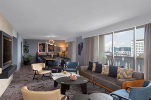a living room with a couch and a table at Hilton Addis Ababa in Addis Ababa