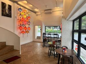 Posezení v ubytování The White Den Sukhumvit 44