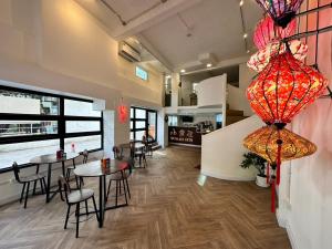 Posezení v ubytování The White Den Sukhumvit 44