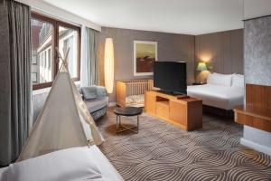 Postel nebo postele na pokoji v ubytování Hilton Berlin