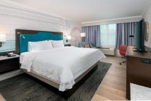 Кровать или кровати в номере Hampton Inn Buffalo-Williamsville