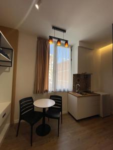 Kuchyň nebo kuchyňský kout v ubytování apartamente Melodi