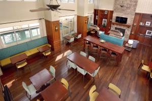 an overhead view of a restaurant with tables and chairs at Hampton Inn & Suites Clinton in Clinton