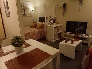 Posteľ alebo postele v izbe v ubytovaní Le Jaude Centre studio