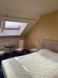 Postel nebo postele na pokoji v ubytování All-in rooms