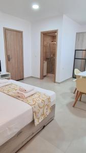 Postel nebo postele na pokoji v ubytování Elite Residence