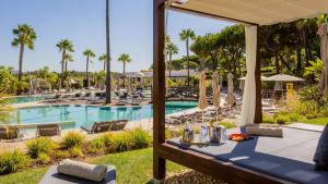 a view of the pool at the resort at Conrad Algarve in Quinta do Lago