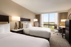 Postel nebo postele na pokoji v ubytování Hilton Fort Collins