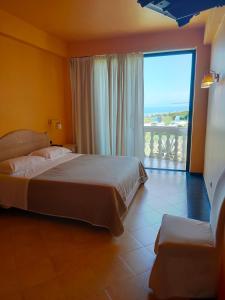 Postel nebo postele na pokoji v ubytování Hotel La Playa Blanca + 37 fotografií