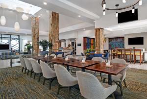 a conference room with a long table and chairs at Hilton Garden Inn Houston/Galleria Area in Houston +37 photos