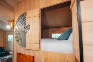 Cosy Forest Lodge客房内的一张或多张床位
