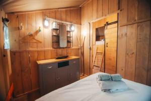 Cosy Forest Lodge客房内的一张或多张床位