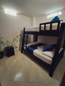 Postel nebo postele na pokoji v ubytování Hotel Mawill