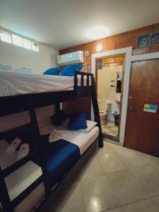 Postel nebo postele na pokoji v ubytování Hotel Mawill