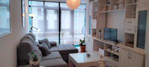 TV a/nebo společenská místnost v ubytování Apartamento Estela