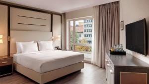 Postel nebo postele na pokoji v ubytování Hilton Munich City