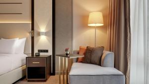 Postel nebo postele na pokoji v ubytování Hilton Munich City