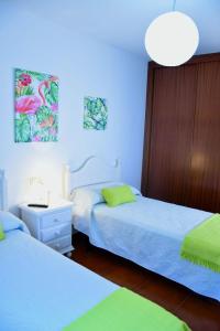 Postel nebo postele na pokoji v ubytování Apartamento Estela