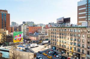 an aerial view of a city with cars and buildings at AMTD Idea Tribeca Hotel in New York