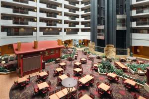 an overhead view of a building with tables and chairs at Embassy Suites by Hilton Hampton Convention Center in Hampton