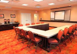 a conference room with a large table and chairs at Hampton Inn & Suites Phoenix Chandler Fashion Center in Chandler +20 photos