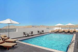 Bazén v ubytování DoubleTree by Hilton Ras Al Khaimah nebo v jeho okolí