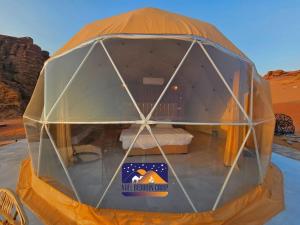 a dome tent in the middle of the desert at Nael Bedouin camp in Wadi Rum