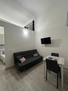 TV a/nebo společenská místnost v ubytování LA CASETTA