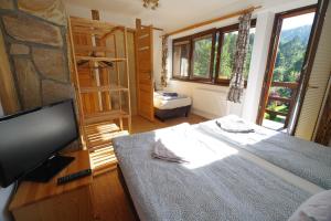 Posteľ alebo postele v izbe v ubytovaní Ski House Szczyrk - Solisko