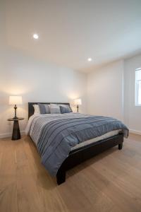 Postelja oz. postelje v sobi nastanitve Universal Studio Stellar Home with pool and jacuzzi