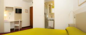 TV a/nebo společenská místnost v ubytování Hotel Da Mario