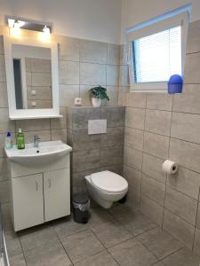 Koupelna v ubytování Apartmány Hodonín + 37 fotografií