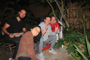 a group of people posing for a picture at Hostel Posada de Gallo in Arica