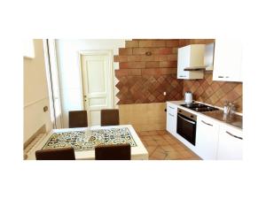 O bucătărie sau chicinetă la La Suite di Florì +18 fotografii