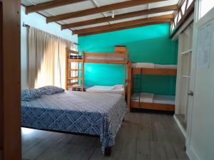 Postel nebo postele na pokoji v ubytování Gaudy's Hotel