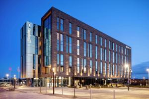 a rendering of a building in a city at night at Hampton By Hilton Stockton On Tees in Stockton-on-Tees