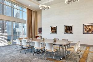a conference room with a table and chairs at Hampton Inn & Suites Atlanta-Midtown, Ga in Atlanta