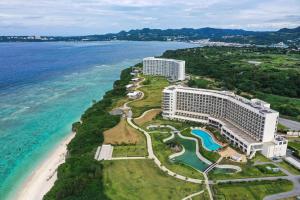 an aerial view of a resort next to the ocean at Hilton Okinawa Sesoko Resort in Motobu