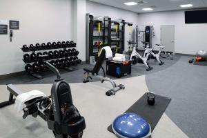 a gym with a lot of exercise equipment in it at Hilton Garden Inn Seattle Lynnwood, Wa in Lynnwood