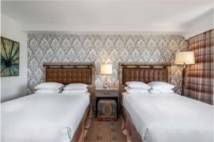 Krevet ili kreveti u jedinici u okviru objekta The Cassara Carlsbad, Tapestry Collection By Hilton