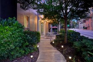 a sidewalk in front of a house with lights on it at Home2 Suites by Hilton Nashville Vanderbilt, TN in Nashville