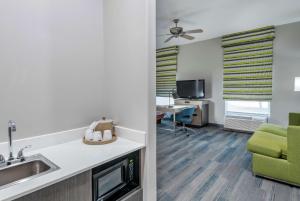 TV a/nebo společenská místnost v ubytování Hampton Inn Brownwood