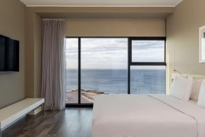 Postel nebo postele na pokoji v ubytování Radisson Blu Hotel, Port Elizabeth